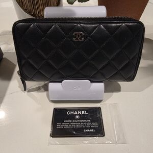 Chanel black quilted zip around long wallet